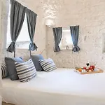 ヴィラ Trulli Terrarossa Con Piscina