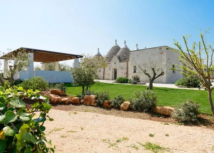 别墅 Trulli Terrarossa Con Piscina